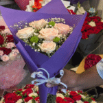 Elegant Peach Rose & Green Pom Bouquet in Purple Wrap