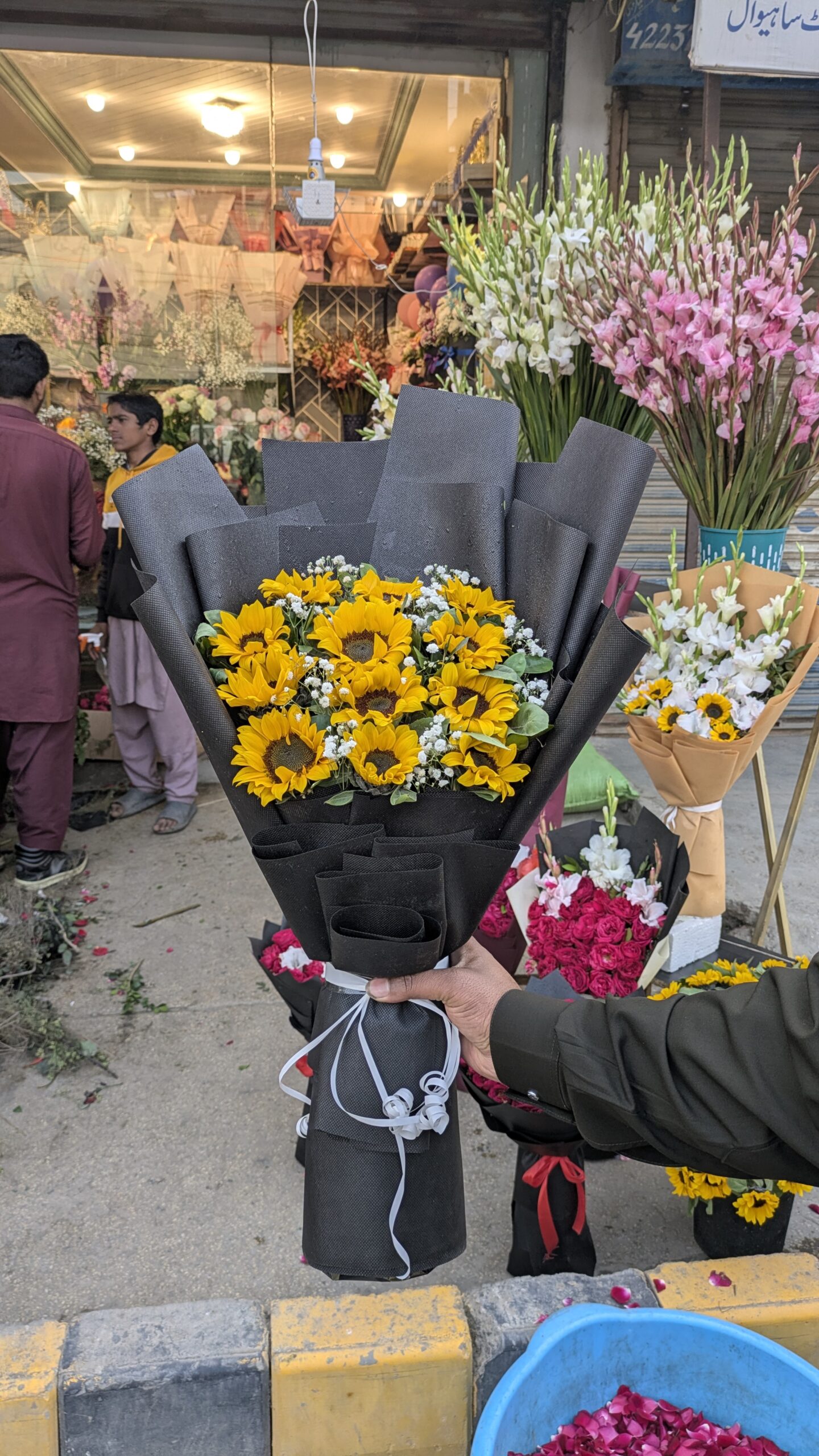 PXL_20260203_120236842 Sunflower π» bouquet with black sheet - Image 1