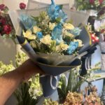 Decent bouquet with blue flowers